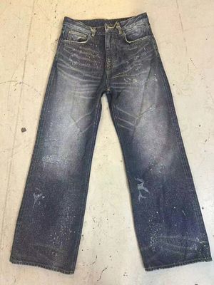 Vintage geïnspireerde verf splatter design denim bodem voor een gedurfde edgy look