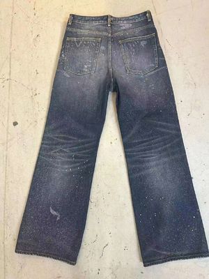 Vintage geïnspireerde verf splatter design denim bodem voor een gedurfde edgy look