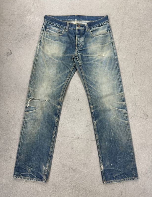 Lichte wasjeens met zwaar vervaagend en snor voor een robuuste vintage look